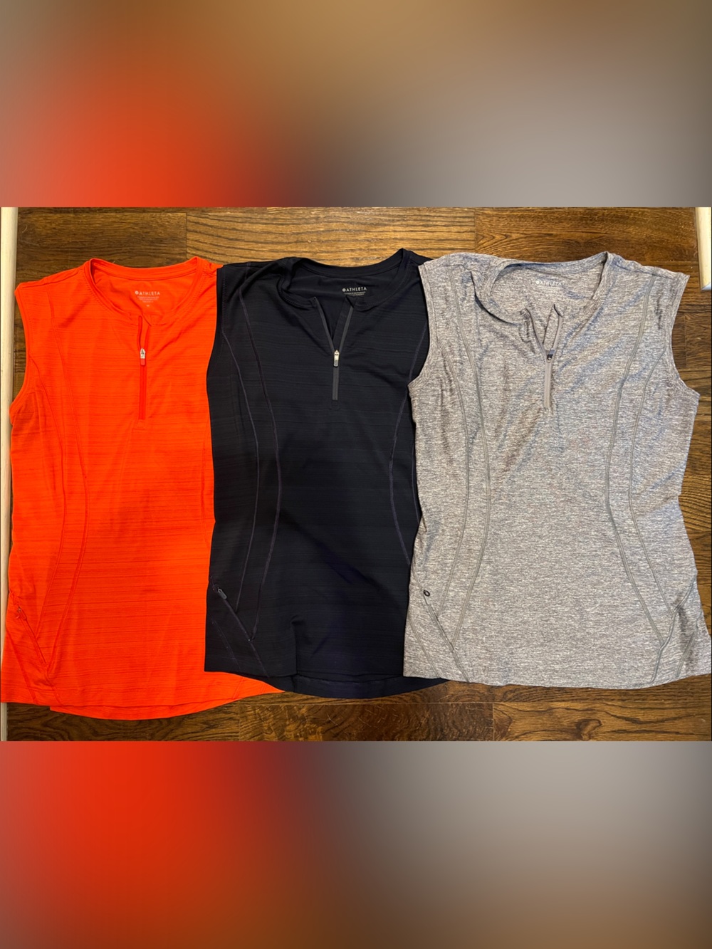 Athleta Sleeveless Zip-Front Tops in Orange, Navy, Gray